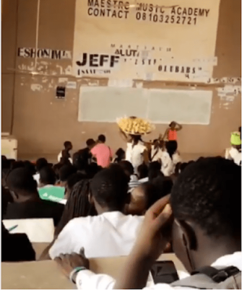 Lady Hawker Selling Plantain Chips Seen In FUTA Lecture Hall (VIDEO)