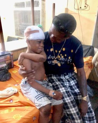 Lagos Collapsed Building: Small Doctor Visits Survivors In The Hospital (PHOTOS)