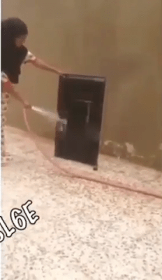 VIDEO : Maid Washing TV With In Saudi Arabia, After Been Told To Clean The TV