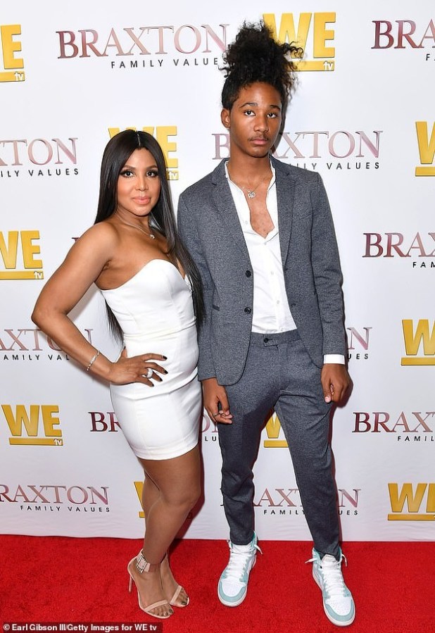 Toni Braxton plants a sweet kiss on her son Diezel, 16, as they step out together for Braxton Family Values premiere (Photos)
