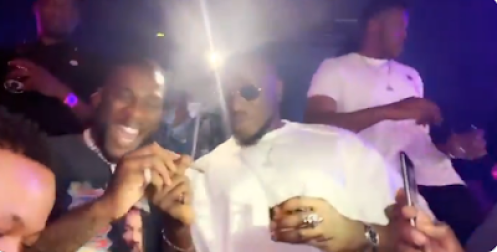 Burna Boy And Peruzzi Hang out Together As They Share The Same Cigarette