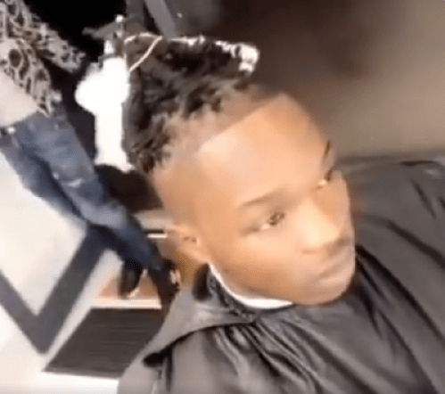 Naira Marley Barbing His Hair After Release On Bail From Jail