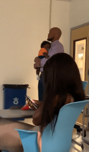 Professor Helps Student To Calm Crying Baby During Lecture As He Continue Teaching