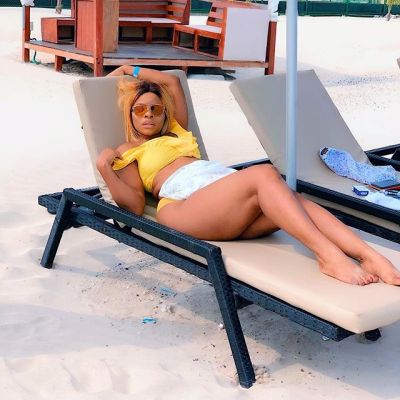 Laura Ikeji Stuns In Bikini As She Seats On Her Husband (PHOTOS)