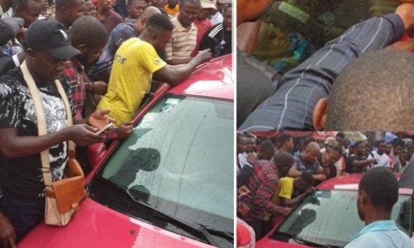 Baby gasping for air after being locked up in a car by his mum, rescued by traders in Lagos (video)