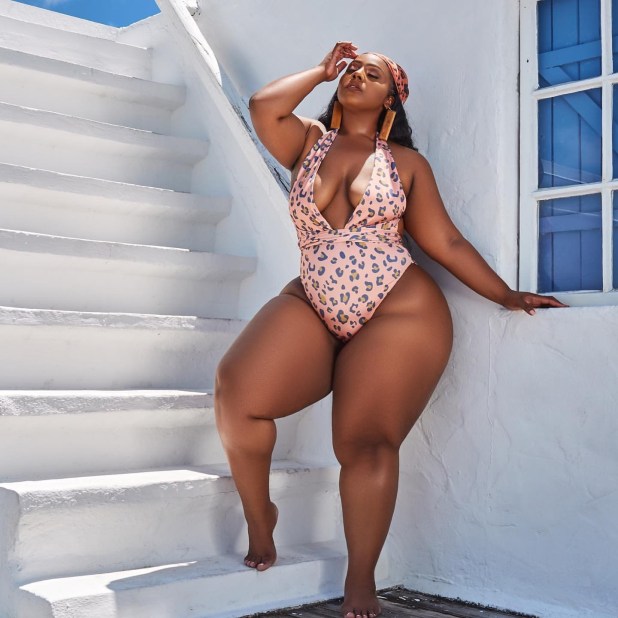 Plus sized South African lady flaunts her curves in a swimsuit