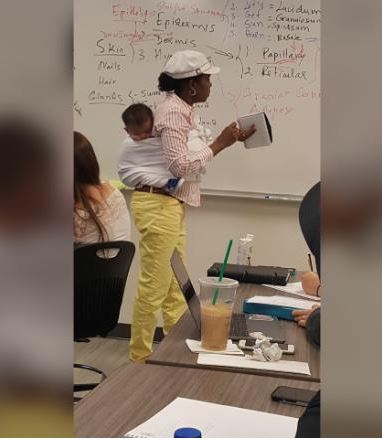 Georgia professor holds baby