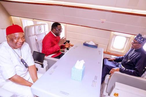 Buhari, Ayade and Hope Uzodinma inside the presidential jet