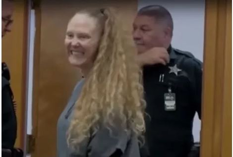 Amber Maltese smiling after appearing in court for murder