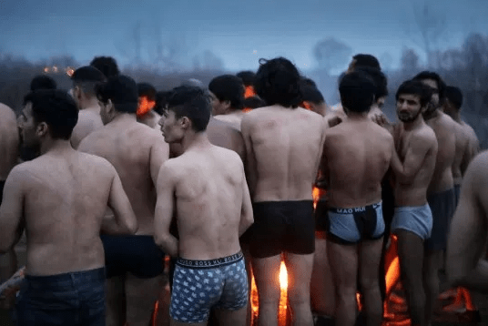 Refugees attempting to enter Greece are stripped to their underwear and forced back to Turkey (photos)