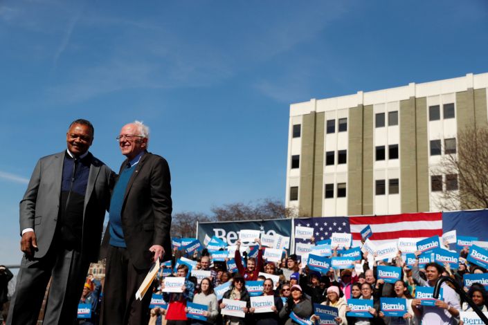 Civil rights activist Rev. Jesse Jackson stands on stage after endorsing presidential candidate Bernie Sanders at a rally in Grand Rapids, Michigan, on Sunday. (Photo: Lucas Jackson / Reuters)