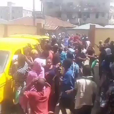 Hungry Lagosians stealing food from bus