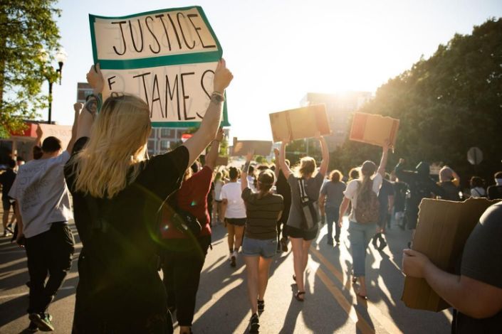 People protest the killing of James Scurlock in Omaha. (Anna Reed/the World-Herald)