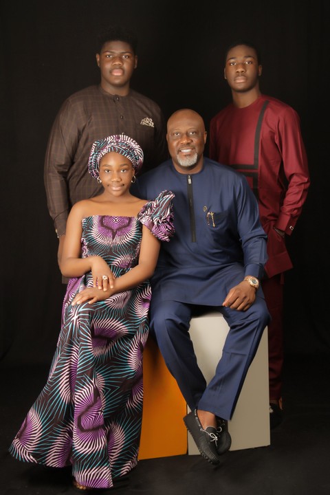 Dino Melaye posing with his family members