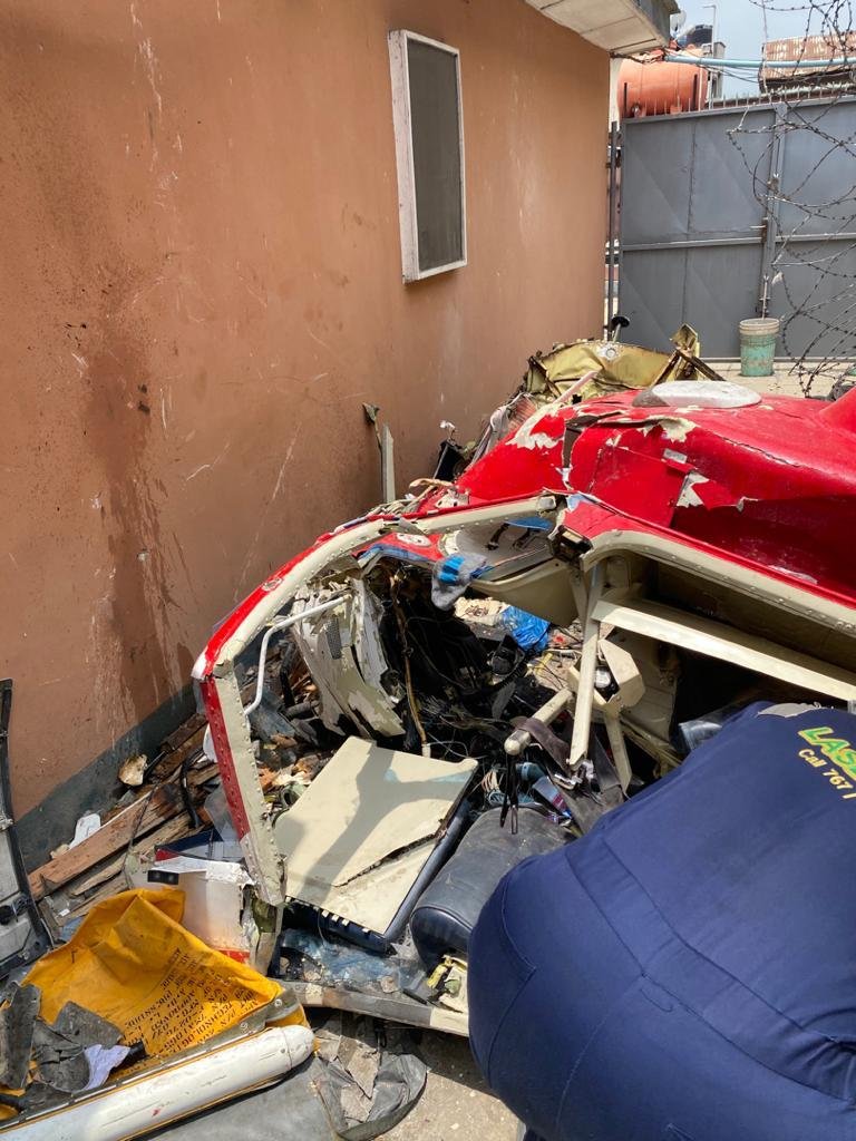 UPDATE: Photos from the scene of helicopter crash in Opebi Lagos 18