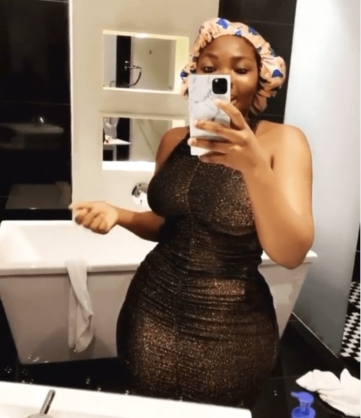 Uche shows off backside