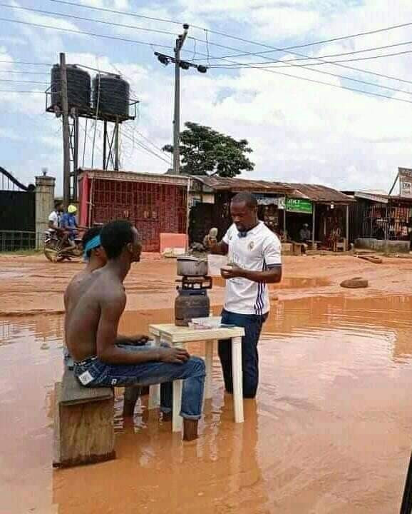 Imo Youths Cook And Swim In Muddy Water To Expose Terrible State Of A Road [Photos] 1