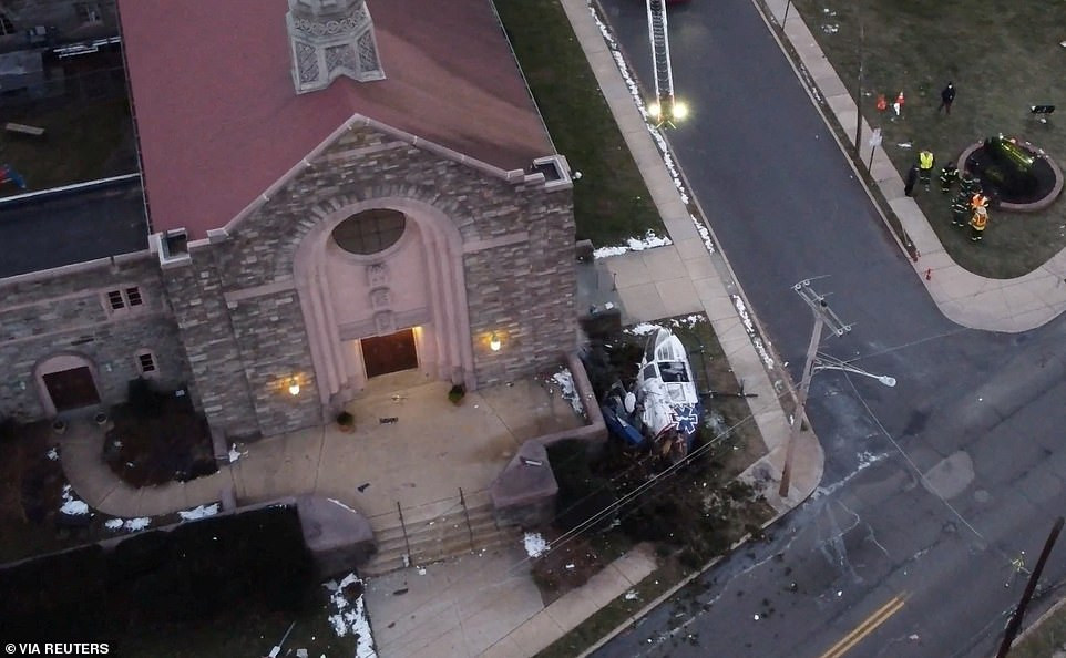 Medical helicopter transporting sick baby crashes in front of church but all four onboard 
