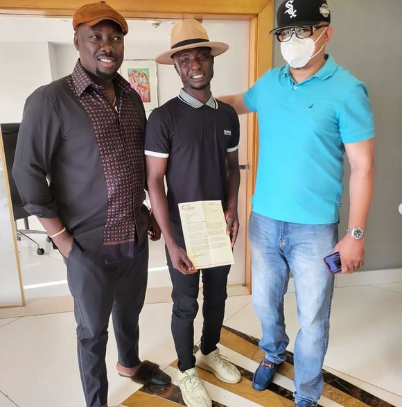 Lagos Hawker Receives Scholarship Letter From Obi Cubana, Placed On N100,000 Salary