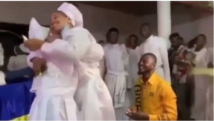 Nigerian Lady Attempts To Run As Her Man Proposes To Her During Church Service [Video]