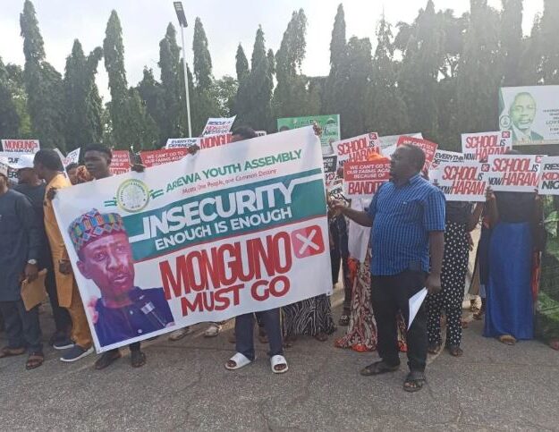 Insecurity: Drama As Group Protests In Abuja, Demands NSA’s Removal (Photo)