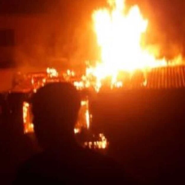 Fire Outbreak In Onitsha As Petrol Tanker Falls After Losing Control, Spills Content