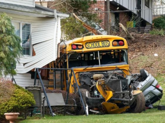 School Bus Packed With Children Crashes Into A House (Photos)