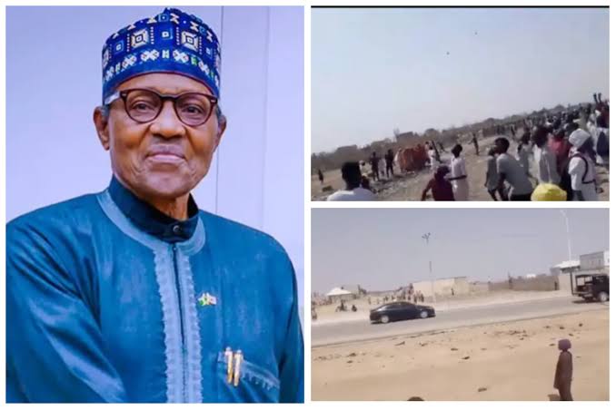 Kano Residents Barricade Roads, Stone Buhari’s Convoy, Helicopter During His Visit [Video]
