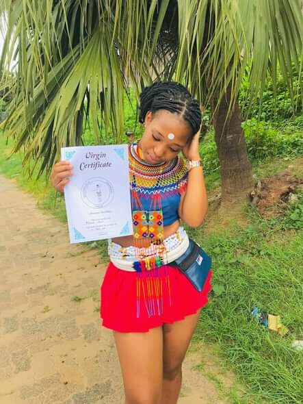 South African Lady Displays Her Certificate Of Virginity Photos 