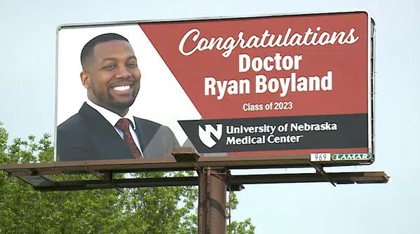 Family Mounts Huge Billboard To Celebrate Son As He Graduates From Medical School