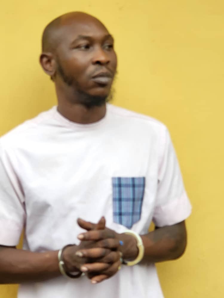 Seun Kuti Handcuffed And Paraded After He Surrendered To Police [Photos/Video]