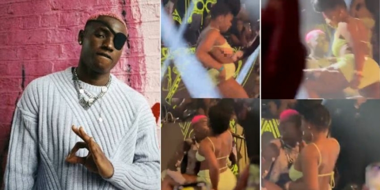 Lady Struggles With Her Miniskirt, Suffers Nip Slip As She Twerks On Ruger’s Laps [Video]