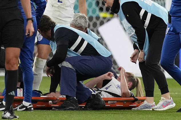 Medical staff stretcher England's Keira Walsh off the pitch after she was injured during the Women's World Cup Group D soccer match between England and Denmark at the Sydney Football Stadium in Sydney, Australia, Friday, July 28, 2023. (AP Photo/Mark Baker)